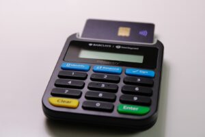 black and blue calculator on white table